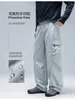Pantalones impermeables de la marca de moda IZEXX, sin flúor, a prueba de salpicaduras, resistentes al desgaste, unisex, versátiles para otoño, estilo hip-hop americano, pantalones de pierna ancha rectos holgados