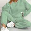 Conjunto de Duas Peças Outono e Inverno 2025 Novo Europeu e Americano Roupas Femininas Top de Gola Redonda com Mangas Longas e Padrão Trançado e Calça Leggings 9918