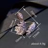Anillo de imitación de diamantes de estilo europeo y americano Cao Shi, de alta calidad, con forma de hoja de parra y apertura ajustable, joyería para mujer.