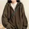 Suéter coreano de otoño e invierno, minimalista y elegante, con capucha y cordón, una prenda exterior de nicho, de corte holgado y manga larga en color gris, adecuada para figuras petite.