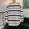 Camiseta holgada de hombre estilo coreano con puños acanalados, top a rayas de manga larga con estampado digital de moda otoño/invierno 2026 para mujer