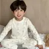 Ropa de casa de algodón puro para niños, ropa de otoño tipo A para niños de talla mediana y grande, conjunto de pantalón y ropa de otoño e invierno con aire acondicionado para niños y niñas.