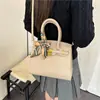 Bolsa de mão minimalista de nicho para mulheres, nova coleção outono 2026, moderna, simples, de alta qualidade, elegante bolsa de ombro e bolsa transversal