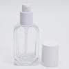 Estoque de fábrica 30ml fundo grosso plano transparente frasco de vidro com pump frasco de essência frasco de emulsão cosméticos sub-embalagem