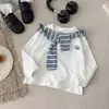 Camiseta base de chal bordado 2026 otoño nueva camiseta base para niños, moderna y versátil, manga larga de algodón puro para niños y niñas