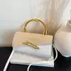Bolsa Feminina Minimalista 2026 Verão Nova Cor Color Block Moda Bolsa de Mão com Textura de Alta Qualidade, Estilosa e Única Tendência Bolsa Transversal Pequena Quadrada