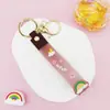 Llavero Colgante de Cordón de Cuero con Letra Transparente Brillante con Accesorios Estilo Muñeca Rellena de Aceite Encanto de Llavero Pulsera Venta al por Mayor