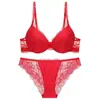 Lencería sexy de importación transfronteriza con escote pronunciado, sujetador push-up para busto pequeño, anti-caída, conjunto de sujetador de encaje rojo para el año zodiacal