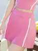 Top deportivo de bloques de color personalizado con tacto nude, espalda descubierta hermosa, falda deportiva de línea A de cintura alta, conjunto de fitness para exteriores