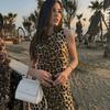 Vestido corto con estampado animal, cintura alta, sin mangas y estilo callejero para mujeres europeas y americanas de 2024.