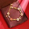 Pulsera de oro arena de Vietnam sentido del diseño color marea nacional pulsera de borla de flor viento cortesano durante mucho tiempo no se desvanece joyería al por mayor