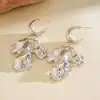 Brincos Europeus e Americanos Transfronteiriços de Folha Metálica, Brincos com Design Exquisito Retrô, Brincos de Nicho de Alta Qualidade para Mulheres
