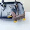 Venta Caliente Transfronteriza Colgante de Dachshund Creativo para Colgar en Bolsos Llavero de Coche de Perro Salchicha de Cuero PU Lindo Regalo