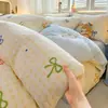 2026 nuevo juego de ropa de cama de cuatro piezas estilo fresco, terciopelo de leche impreso, 200g engrosado