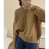 Suéter de punto de cable de lana pura de alta gama con bloques de color y cuello redondo para mujer, con un estilo relajado, un diseño engrosado y se puede usar como capa base o como prenda exterior.