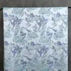 Tecido jacquard floral de seda azul acetinado e prata para vestidos, roupas e materiais decorativos de design