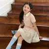 Conjunto de Verão Infantil Menina Manga Curta 2026 Novo Modelo Conjunto Tendência de Duas Peças com Polo Fino e Saia Curta