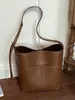 Bolso Maillard de alta gama para mujer, nuevo bolso popular de hombro y cruzado para otoño e invierno 2026, bolso tipo cubo de moda vintage