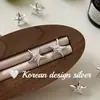 Brincos novos em design ins estilo japonês e coreano, tarrachas de estrela do mar com pérola em prata de lei S925 para mulheres, estilo simples e elegante