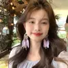 Pendientes Exóticos de Estilo Étnico con Borlas de Plumas Ganchos de Oreja Bohemios Suaves Retro Pendientes de Estilo Vacacional de Yunnan