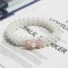 Estilo Japonés Trendy Lazo Grande Gancho Cinturón Elástico de Perlas Decorativo para Vestido de Mujer Combinación Versátil Cadena de Cintura Casual