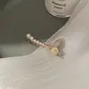 Grampo de Cabelo de Pérola de Luxo Estilo Celebridade da Internet Coreana Ins Simples Lateral Presilha de Cabelo para Testa Grampo de Cabelo Acessório para Franja Atacado