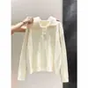 Suéter de punto tipo polo coreano para mujer, con diseño de tres botones, tela suave y cómoda, corte corto y holgado, y estilo dulce de manga larga, perfecto para otoño e invierno.