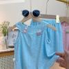 Traje de falda de tirantes con cuello redondo de verano 2025 para niños, conjunto de dos piezas con falda de volantes calada para niña, estilo coreano para bebé