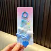 Colgante de cadena para teléfono con pompón de cuentas de corazón de dibujos animados para mujer, llavero acrílico, accesorio para bolso, pequeño regalo al por mayor