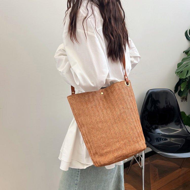 编织包女包新款潮2024夏草编简约百搭小清新水桶包个性单肩斜