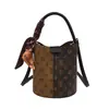 Bolso de mano de alta gama para mujer, nuevo modelo 2026, bolso tipo cubo con monograma estampado madre-hija, versátil para llevar al hombro, cruzado y de mano para ventas transfronterizas