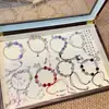 Pulsera Trenzada de Cuerda Ancha con Cuentas Esmaltadas Diseño Original Nuevo Estilo Étnico Chino Pulsera Versátil para Novia Puesto Callejero de Mujer