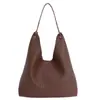 Bolsa tote popular transfronteiriça para mulheres, bolsa de ombro e transversal casual versátil de grande capacidade, bolsa trançada retrô moderna para comércio exterior