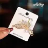 Nuevo Broche de Perla de Dos Hojas Anti-Exposición, Elegante y Versátil, Pin Hebilla Decorativo de Gama Alta para Ropa de Escote Bajo