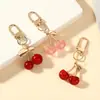 Llavero Colgante de Cereza Frutal Transparente Brillante Europeo y Americano Transfronterizo Llavero de Cereza Brillante Decoración para Bolso de Mujer Regalo
