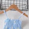 Vestido de verano nuevo para niña estilo europeo y americano, falda de tirantes con tirantes ajustables para niños, falda de flores para bebé, falda de playa