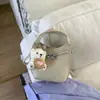 Bolso Cubo Retro de Mano Estilo Coreano de Nicho para Mujer 2026 Invierno Nuevo Elegante Casual Versátil Bolso de Hombro Cruzado