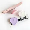 Soporte de Airbag Magnético para Teléfono Móvil con Forma de Corazón de Silicona de Color Puro Macaron, Soporte Retráctil Perezoso para Escritorio Magsafe
