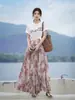 Diseño Feiyuan: Conjunto de Dos Piezas para Mujer: Top de Punto con Mangas Acampanadas y Cuello Redondo + Falda de Estampado Floral Acampanada con Doble Bolsillo, Nuevo Estilo de Verano