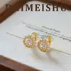 Qingdao Demiushu Estilo Europeo y Americano Lujo Ligero Exquisito Versátil Aretes de Cesta de Flores Bicolor Oro y Plata con Circonita Venta al por Mayor Transfronterizo