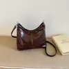 Bolsa Tote Moda 2026 Nova Bolsa Coreana Ombro Inclinado Feminina Outono Brilhante Retrô Grande Capacidade Trabalho Sob o Braço