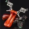 Estilingue aço inoxidável madeira maciça dragão perseguindo fábrica atacado couro plano sem amarração prensagem rápida metal exterior competitivo estilingue