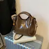 Bolso Cubo de Moda Casual con Personalidad Diseño de Nicho Bolso de Hombro Cruzado 2026 Primavera Tendencia Texturizado Bolso para Mujer