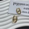 2023 Otoño Nuevos pendientes elegantes de moda simple retro elegante letras viajero versátil estilo coreano pendientes de dos colores