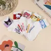 Calcetines Nuevos de Otoño e Invierno para Mujer Dongdaemun de Corea del Sur Calcetines de Tubo Medio de Perro Canela de Dibujos Animados Combinación de Colores Calcetines para Niña Calcetines Sanrio