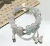Arcoíris de verano ~ pulsera de nicho de color pequeño y fresco dopamina pulsera elástica de alta gama para mujer de verano al por mayor