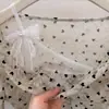 Ruoxin 26 Nueva Colección de Principios de Otoño: Blusa de Manga Larga con Cuello en Forma de Corazón, Falso Dos Piezas