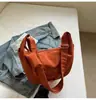 Bolso de Mano para Mujer Diseño de Nicho Estilo Coreano Bolso de Empanada 2026 Nuevo Gran Capacidad Casual Bolso Cruzado de Lona Ligero y Moderno