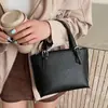 Bolsa Saco Simples Estilo Coreano com Padrão de Lichia para Mulheres 2026 Primavera Nova Design de Nicho Versátil Bolsa de Ombro Wing