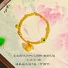 Pulsera de estilo nacional con personalidad de minoría femenina de la tienda de oro Jin Yan con incrustaciones de oro y arena, con diamantes de la generación rica para novia.
